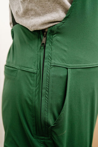 side zipper on green overalls